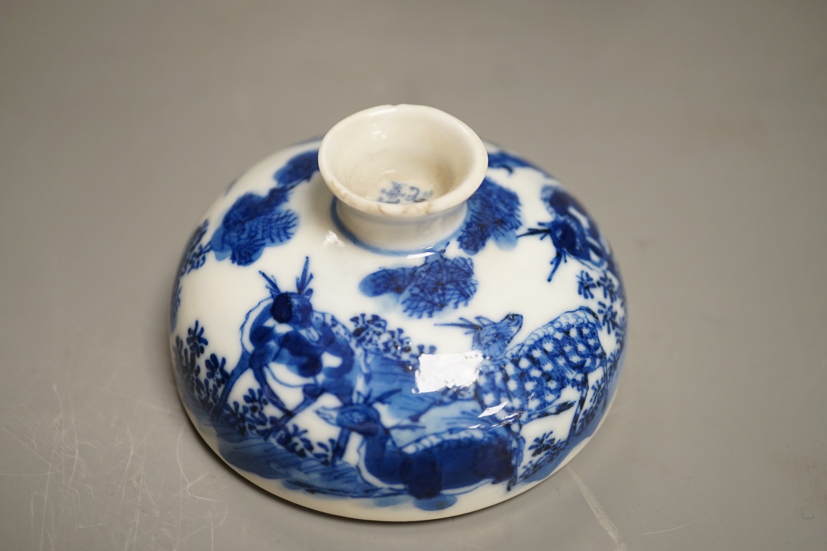 A 19th century Chinese blue and white ‘eight deer’ bowl and cover, ‘man tang fu ji’ mark, 12cm excluding wood stand